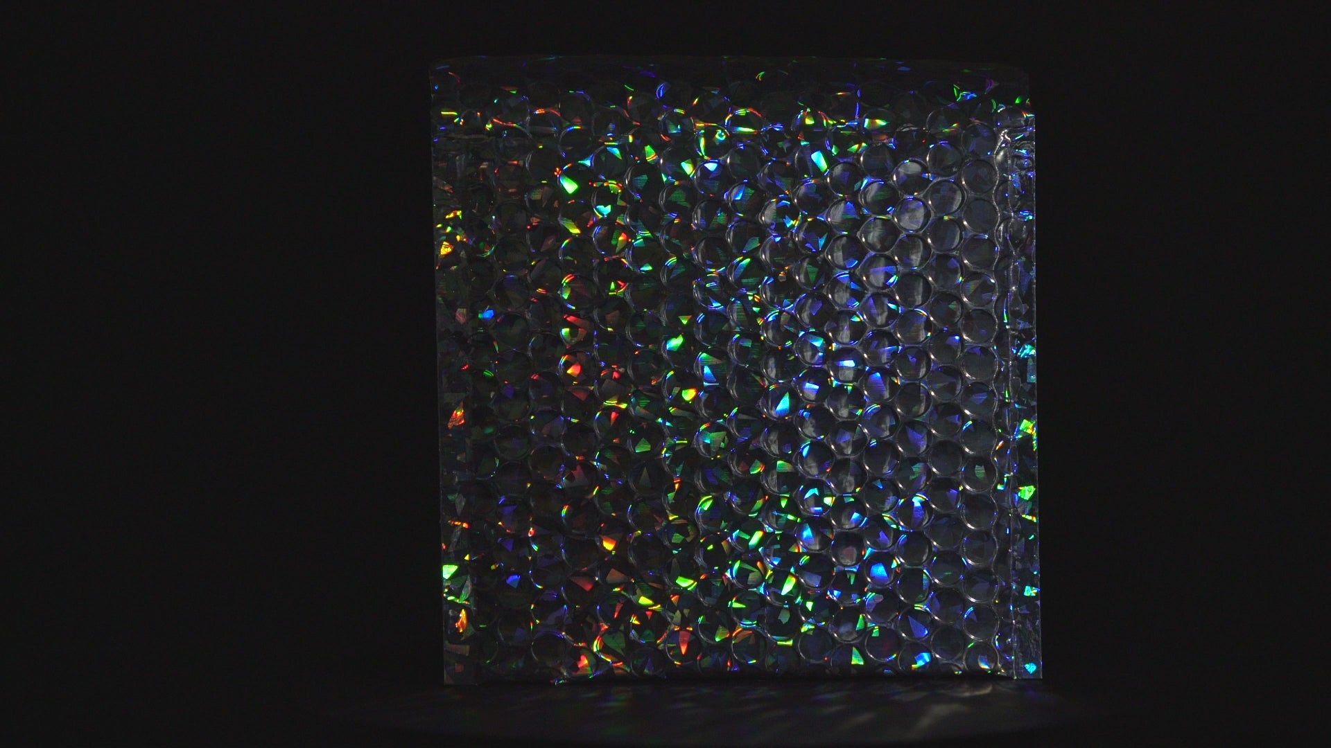 Load video: Blake Packaging Holographic Peel&amp;Seal Holographic Bubble 250x180mm 70Mu Pack 100 Code MBHRA250